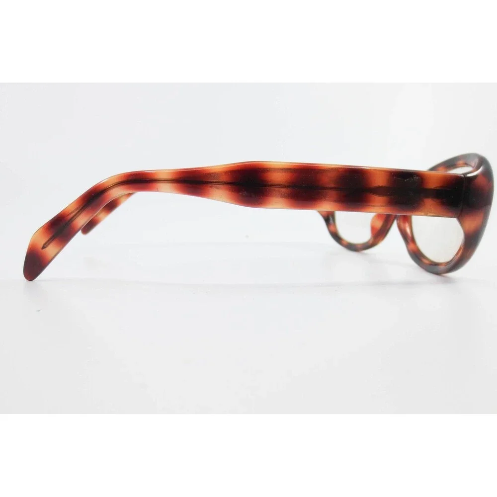 Dkny tortoise shapes
